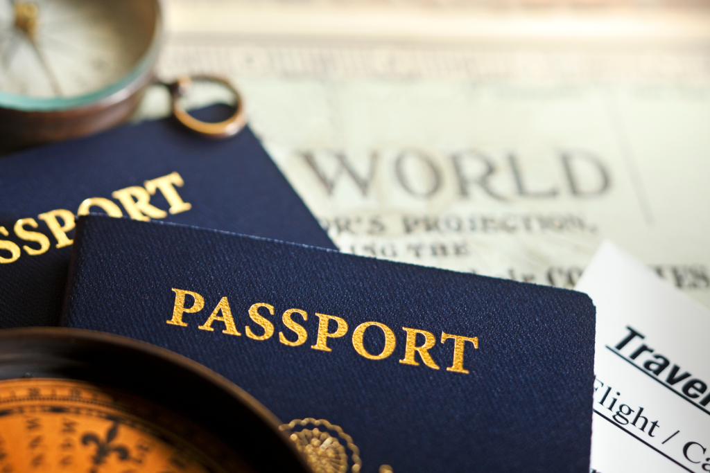 two passports and a world map