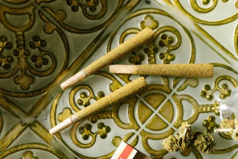 three infused pre-roll joints and some cannabis