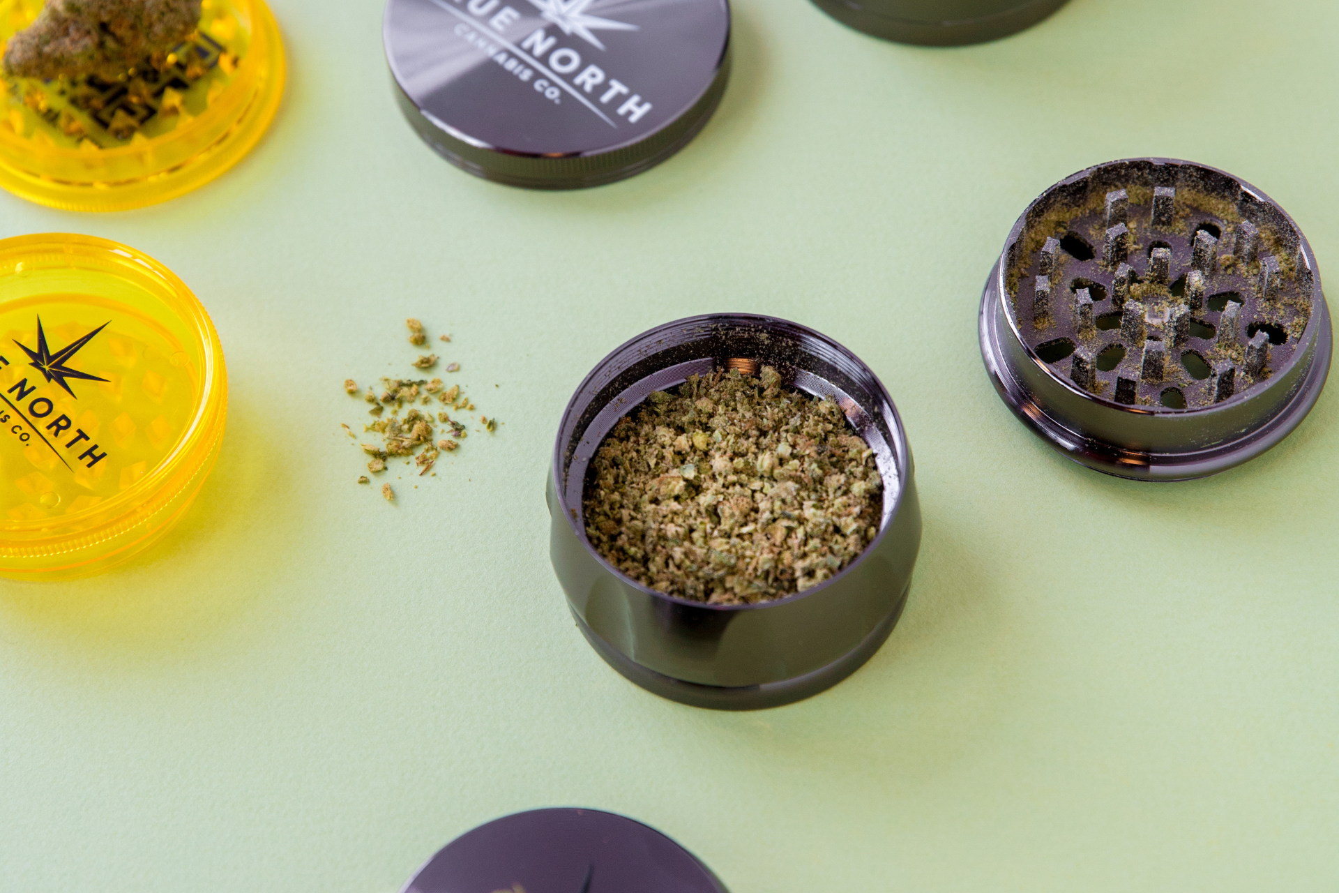 Milled cannabis inside a cannabis grinder